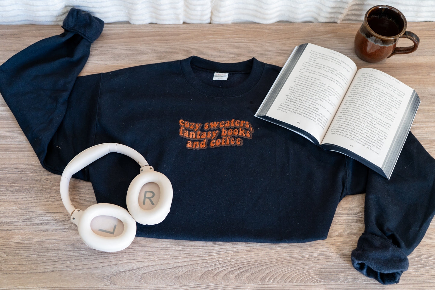 cozy sweaters, fantasy books ,and  coffee hoodie