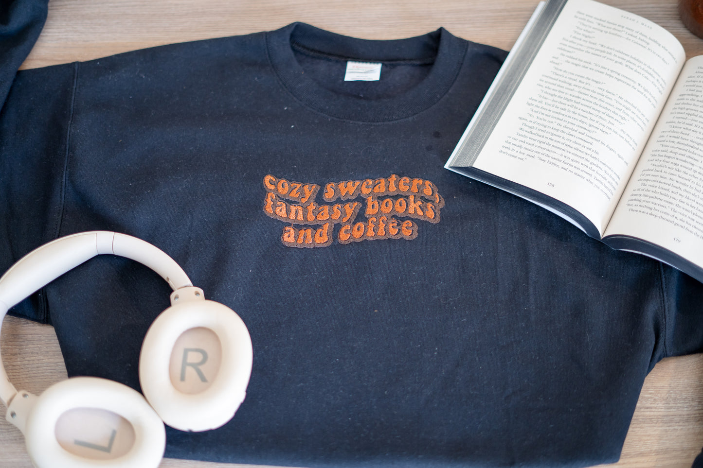 cozy sweaters, fantasy books ,and  coffee hoodie