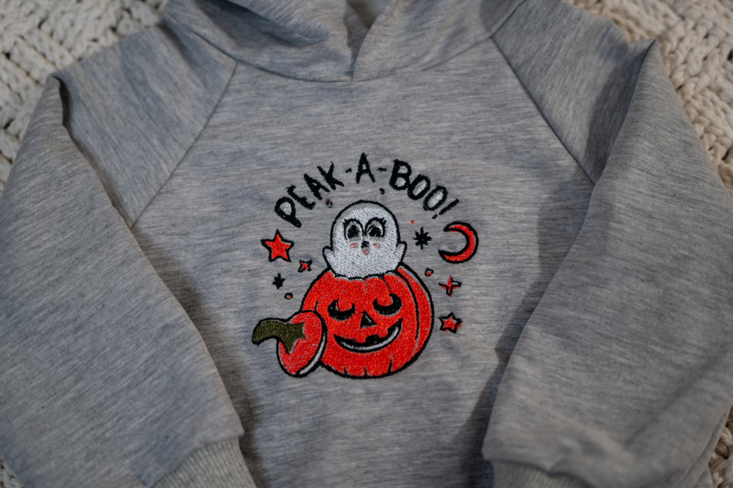 peak-a- boo hoodie