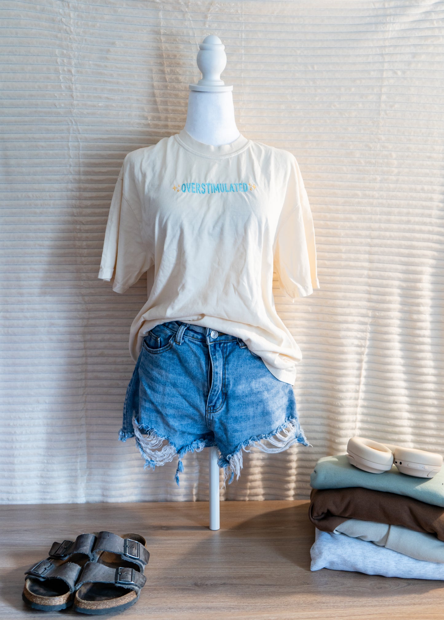 overstimulated tee shirt and long sleeves