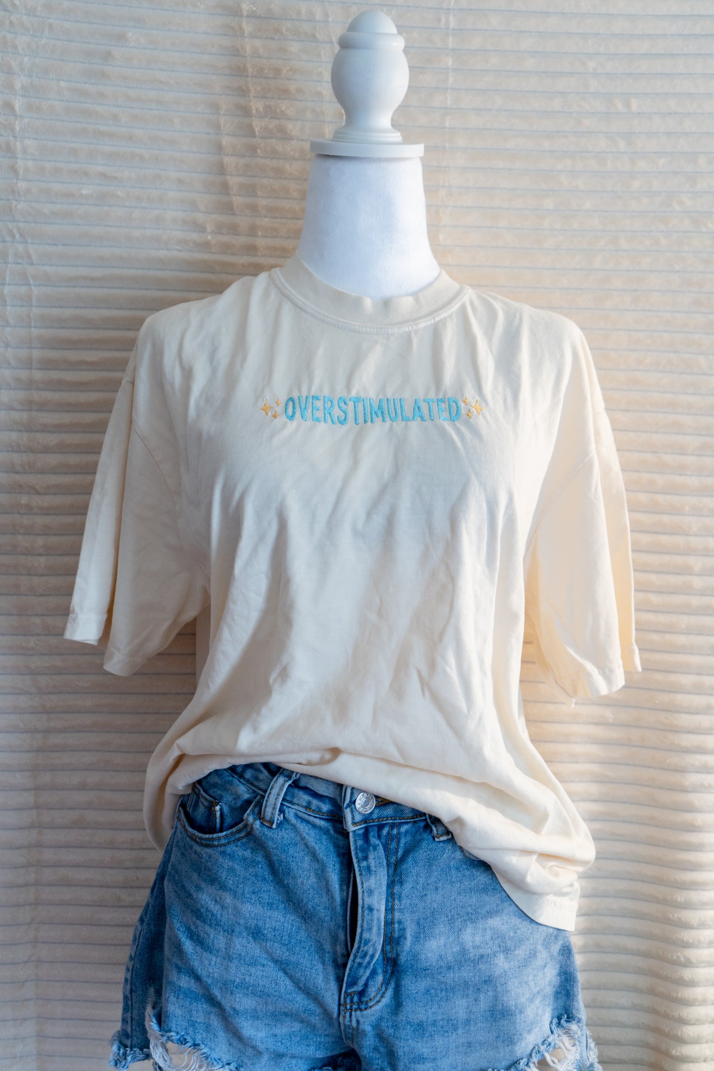 overstimulated tee shirt and long sleeves