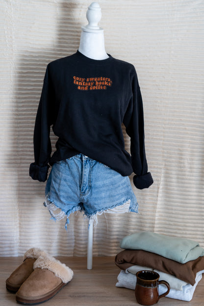 cozy sweaters, fantasy books ,and  coffee hoodie