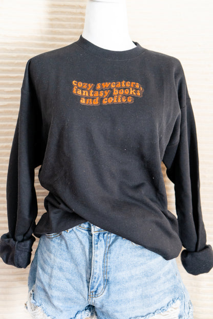 cozy sweaters, fantasy books ,and  coffee hoodie